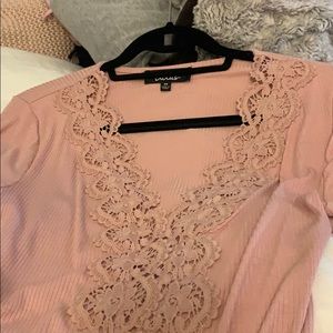 Lulu’s blush pink bodysuit